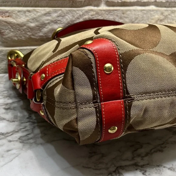 Coach Carly Signature Hobo Bag with red leather trim and gold-tone hardware. - Picture 11 of 14